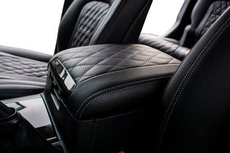 A close up of the back seats in a car