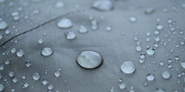 A close up of water droplets on the surface